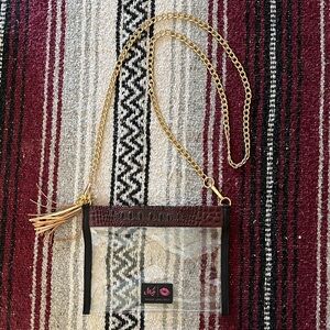 Makeup Junkie Clear Crossbody Bag with Maroon Trim and Gold Chain & Tassle